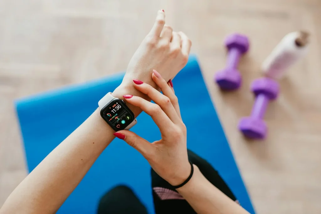 Fitness tracker on a wrist during a workout