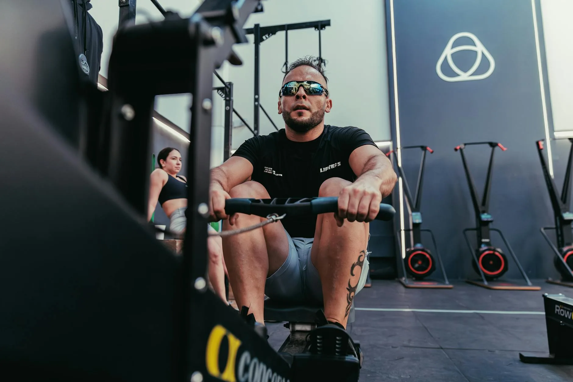 Indoor rowing machine set up for a home fitness workout