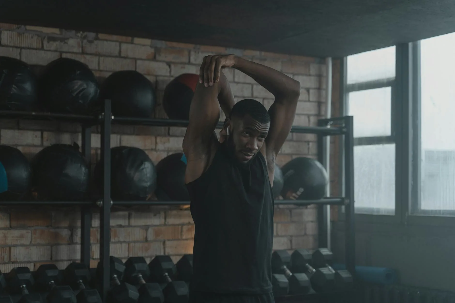 Athlete using recovery tools after a workout