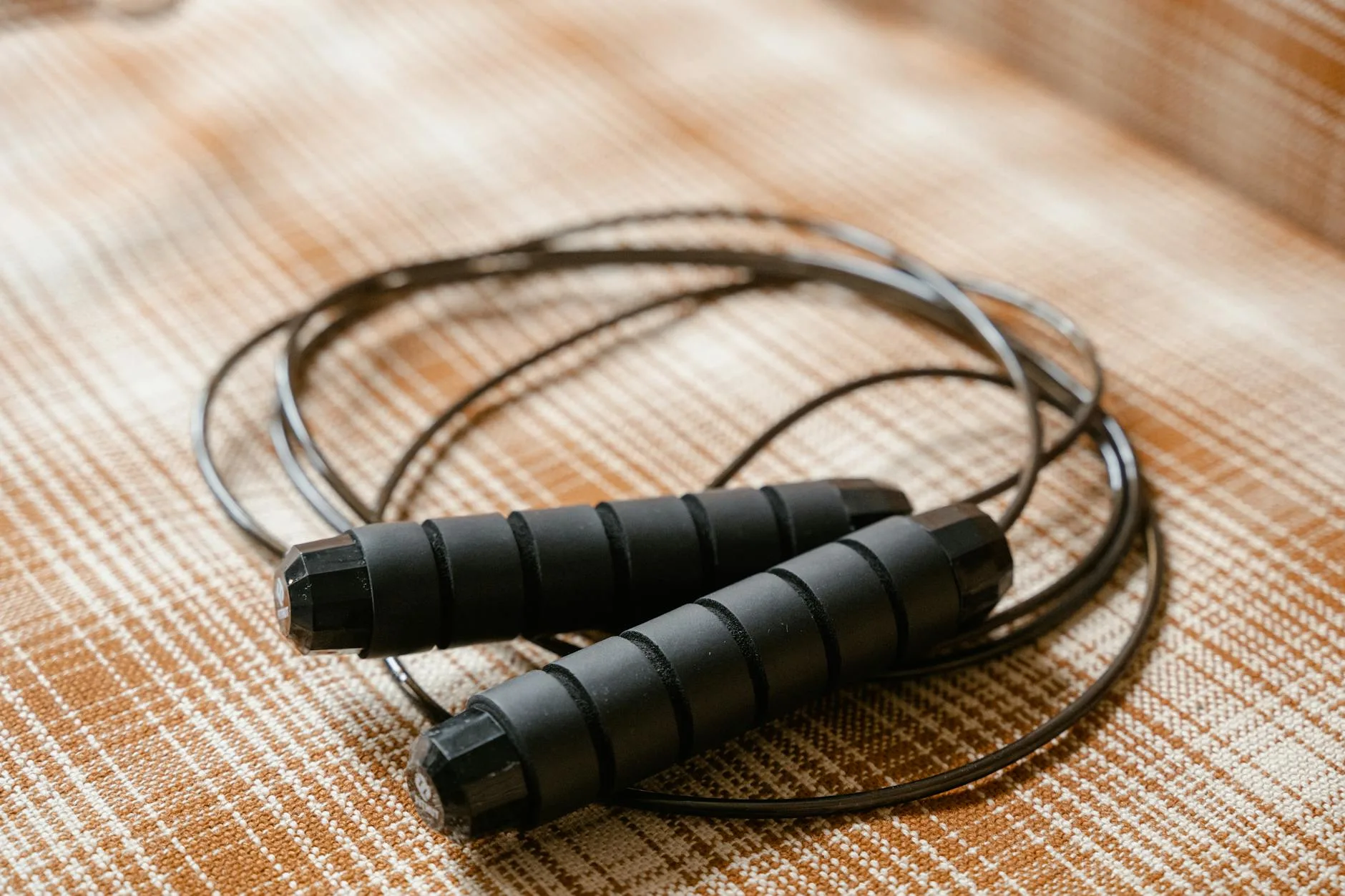 Close-up of speed rope handles with ball bearing mechanism