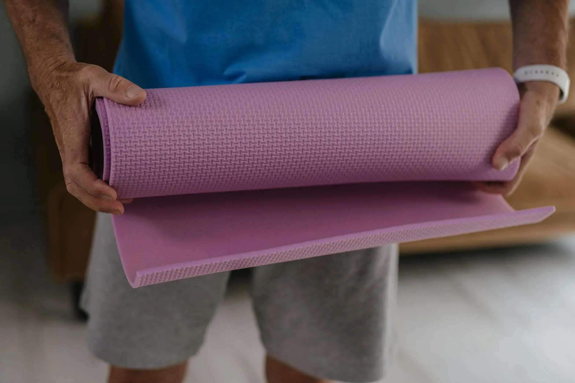 Close-up of a yoga mat showing the textured grip surface