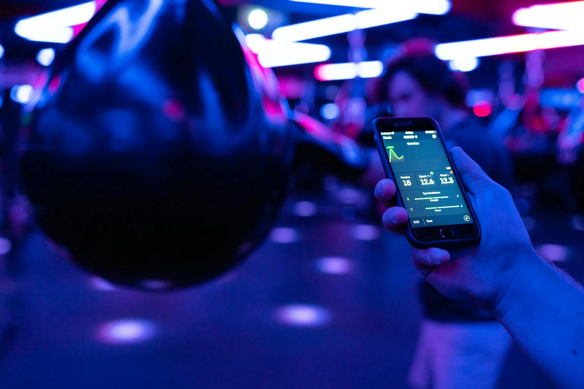 Smartphone displaying fitness app workout tracking data
