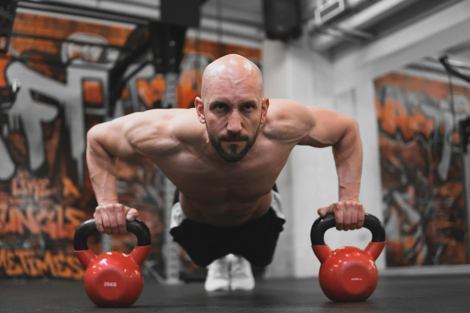 Person performing a kettlebell swing exercise