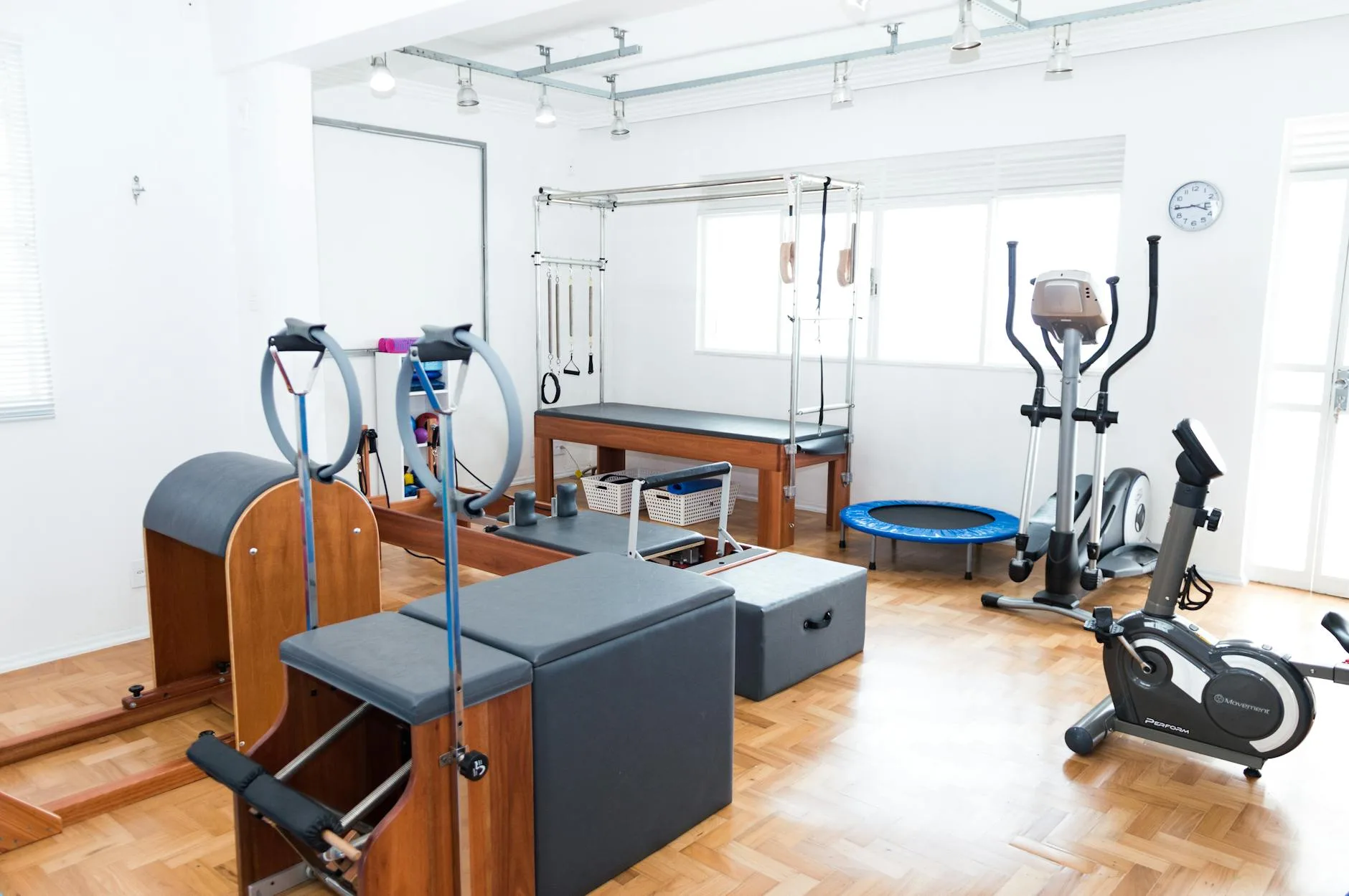 Home gym setup with fitness equipment for rowing workouts