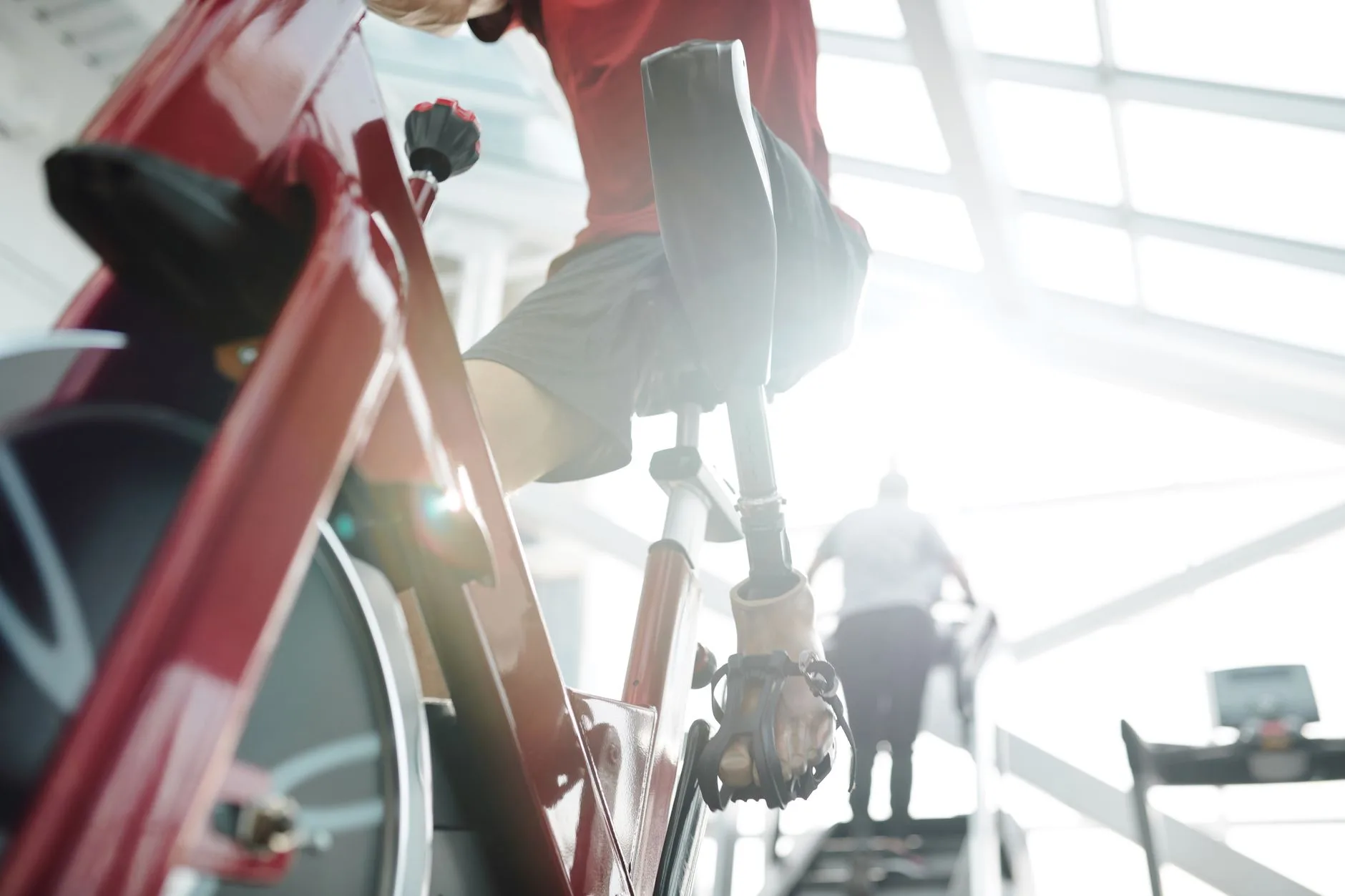 Exercise bike saddle and height adjustment post